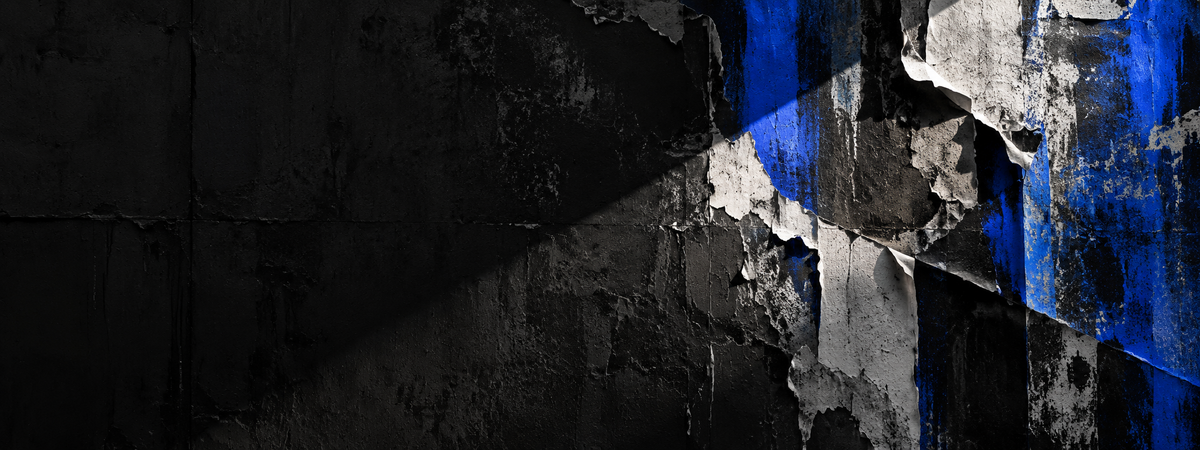 Black textured wall with torn paper and bold cobalt-blue accents